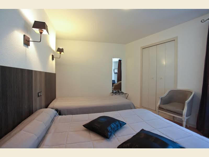 Le Victor Hugo - Hotel Et Restaurant - Logis Hotels Saint Cere Bagian luar foto